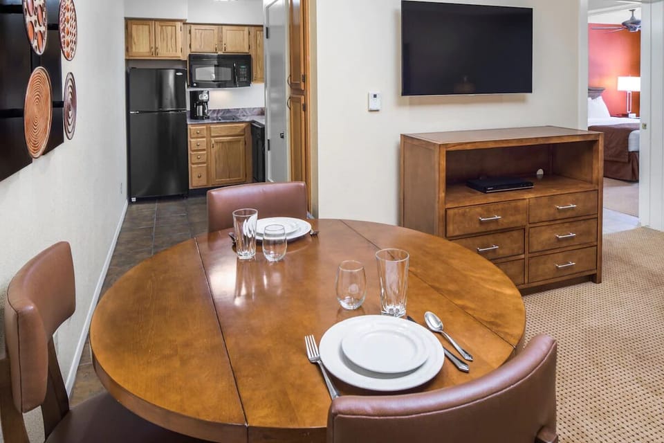 Gather for an easy meal at the cozy dining table.