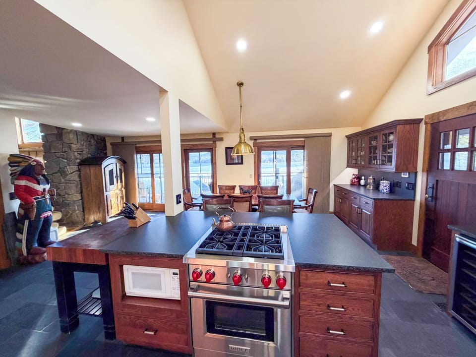 The gourmet kitchen flows effortlessly into the dining area 