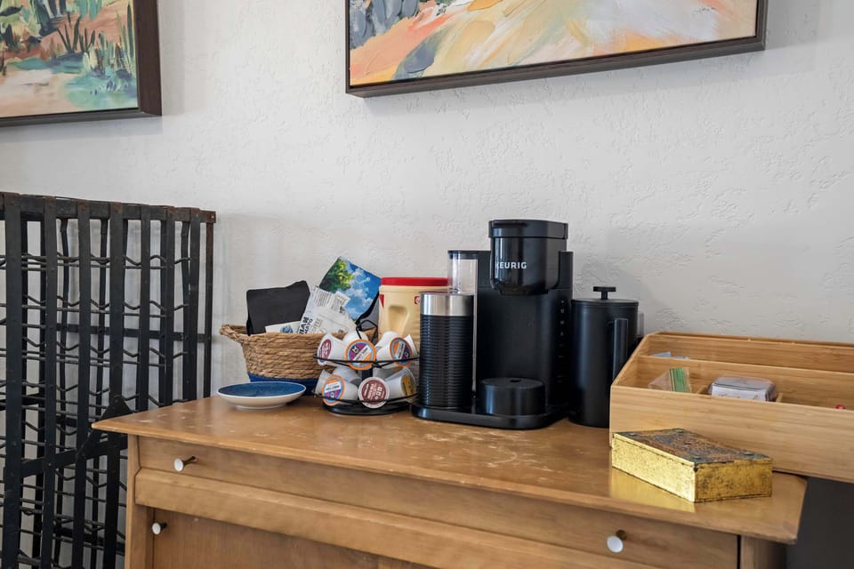 A complimentary coffee station with a Keurig and pods is provided for your stay. This convenience is part of the starter supply prepared to make your arrival as comfortable as possible.