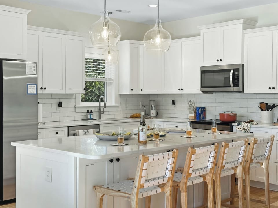 The kitchen comes fully stocked with an induction cooktop.