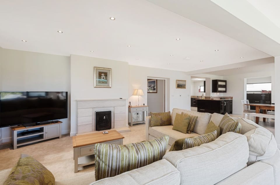 living room leading on to the secure and private beach front garden