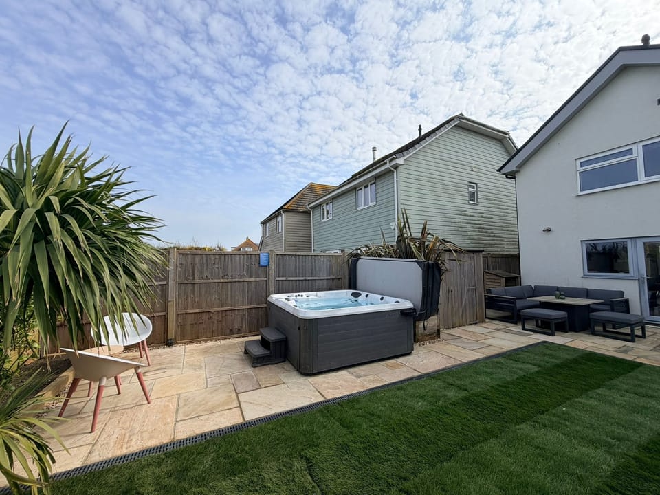 Decked area with a six-seater hot tub (optional extra)