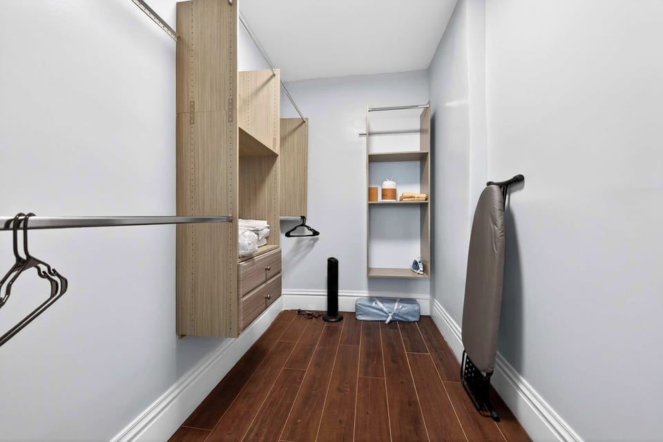 A large walk-in closet offering ample storage for longer stays and added comfort.