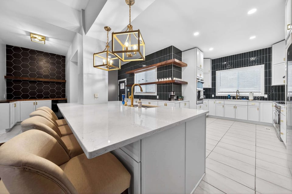 Spacious island seating invites casual meals, conversation, and gathering.