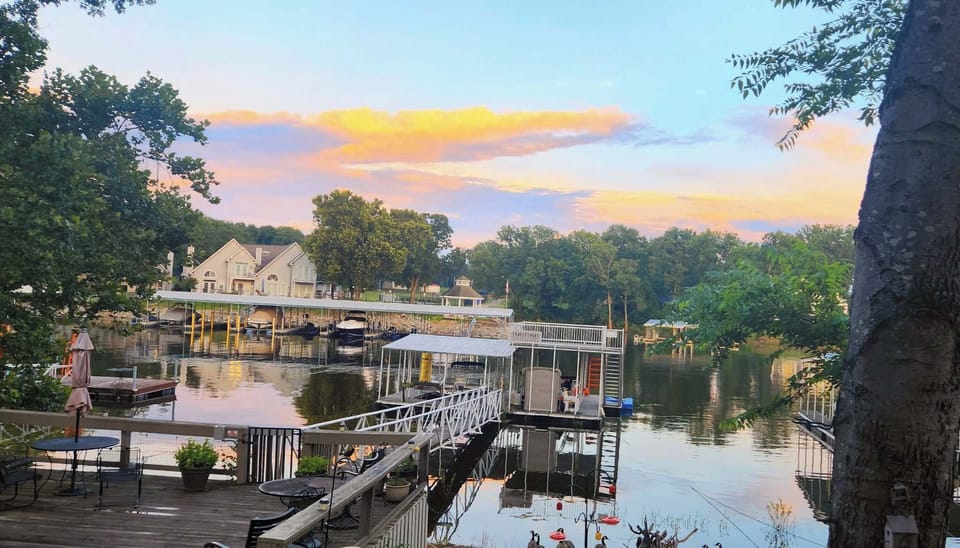 Large dock with upper deck & swim ladder. Shared with neighboring property.