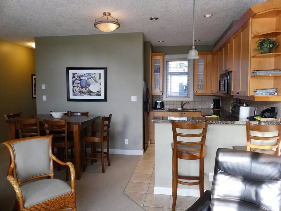 Kitchen with Breakfast Bar and Dining Room