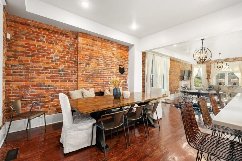 Share meals and moments — the open dining area flows seamlessly into the spacious living room for easy connection and conversation.