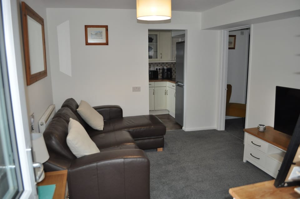 Kitchen and bedroom access from the lounge