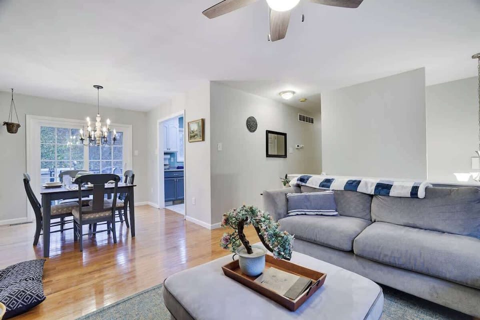 Living Room: Bright and inviting space with spacious seating and elegant dining for memorable gatherings!