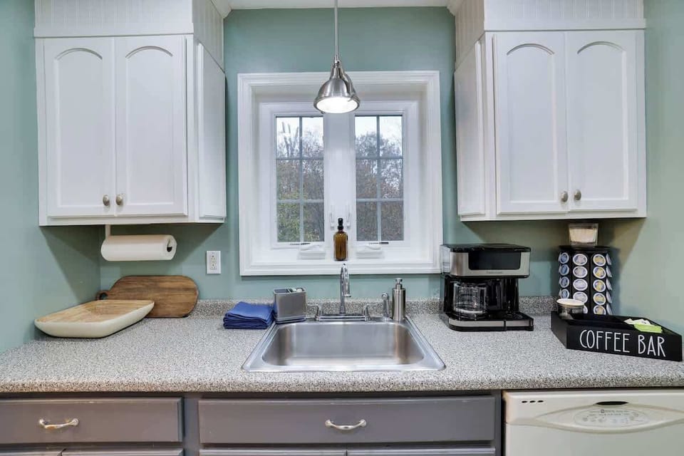 Enjoy morning brews with whimsical decor and natural light in this charming space!