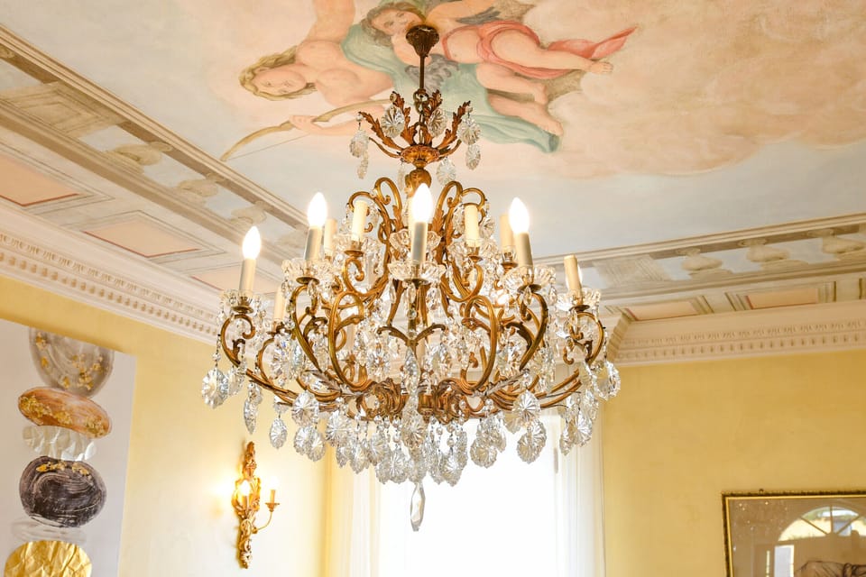 Period details at Villa Bugatti, Desenzano. Marriott standard (2025). Stay 6+ nights and receive a complimentary train ticket to Venice. Experience the noble charm of Lake Garda.