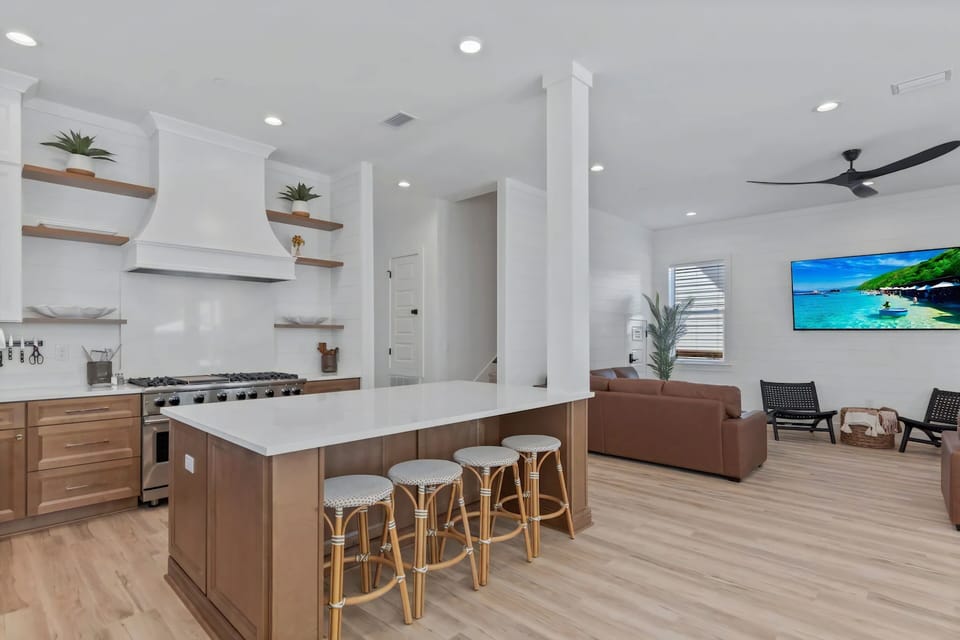 Thoughtfully styled throughout with island seating for 4.