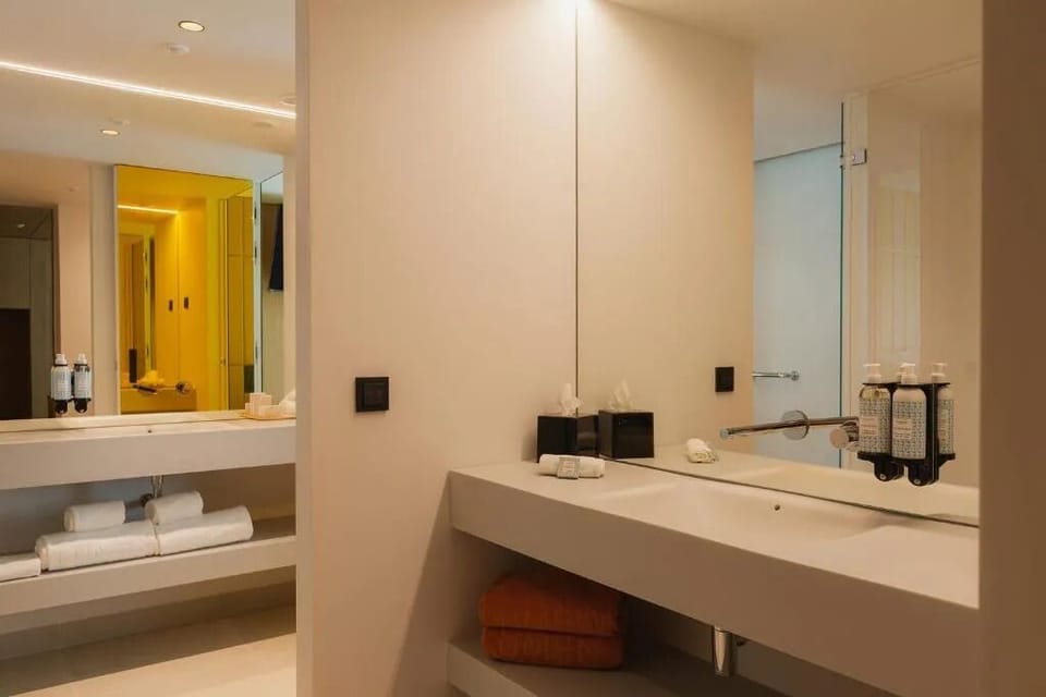 Get ready with a generous vanity and well-lit mirror space.