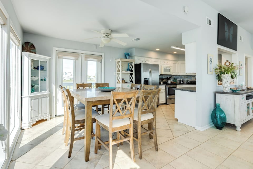 Easily serve homecooked meals from the adjacent kitchen