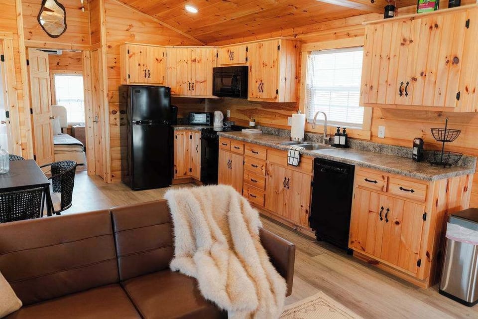 Kitchen: Bright, wooden haven with modern appliances—perfect for whipping up delicious meals!