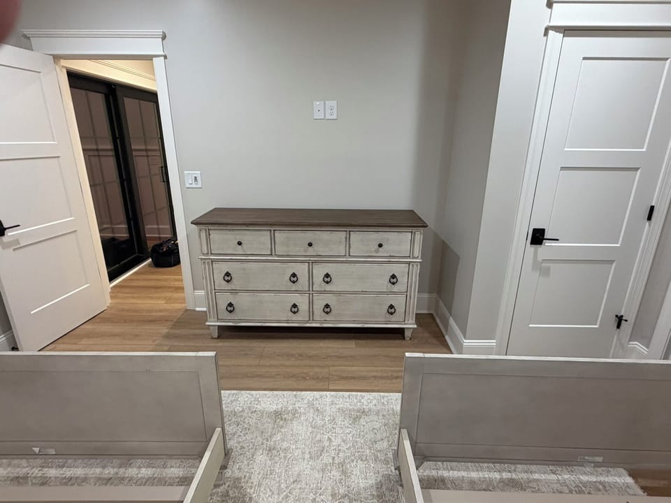 Double Queen Bedroom.  TV to be added above dresser. 