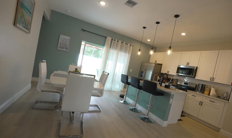 Open-concept kitchen and dining space for easy family connection.
