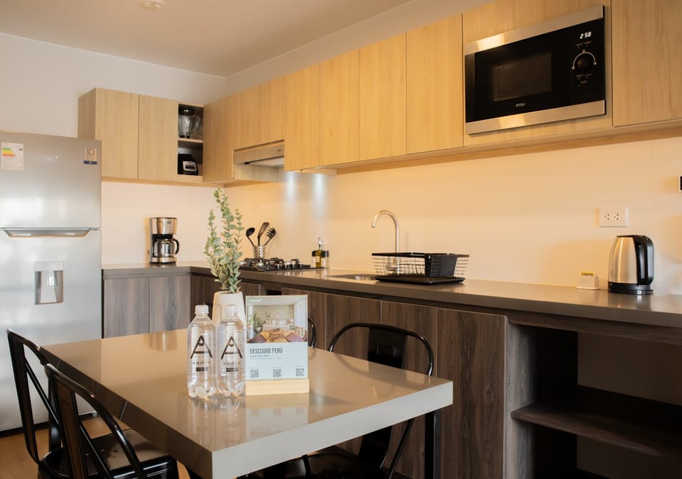 Open kitchen and dining area with modern finishes.