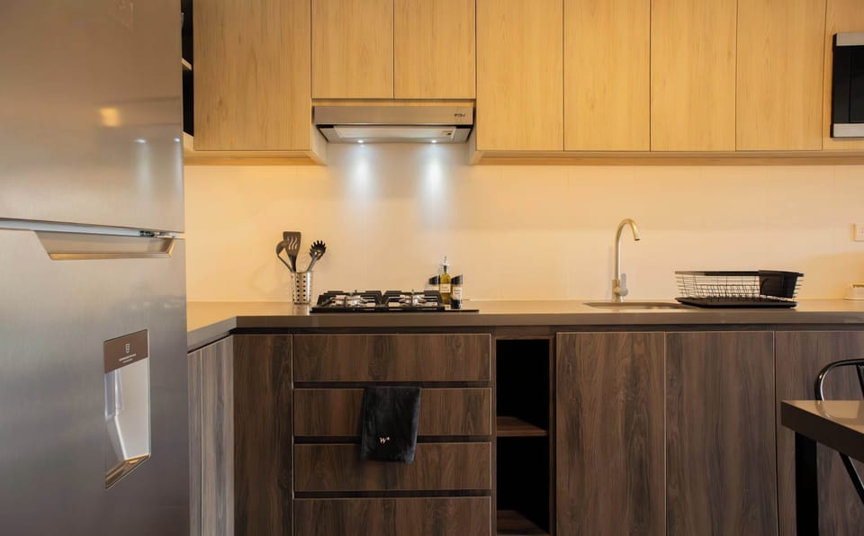 Additional view of the kitchen and cooking area.