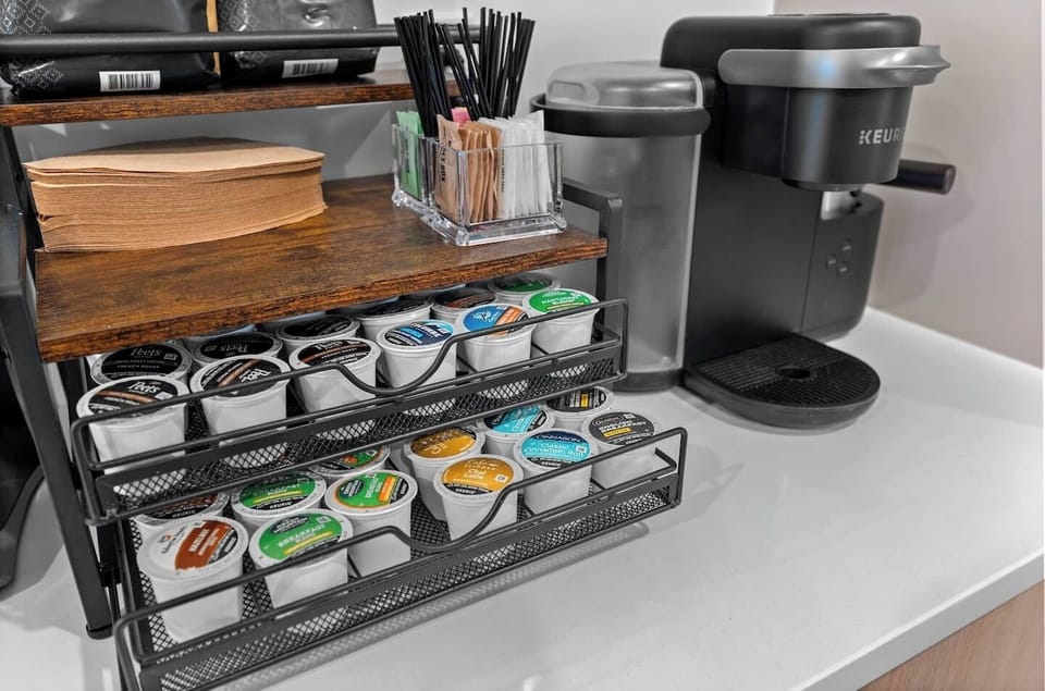 Complimentary coffee, sugar, cream, and to-go cups