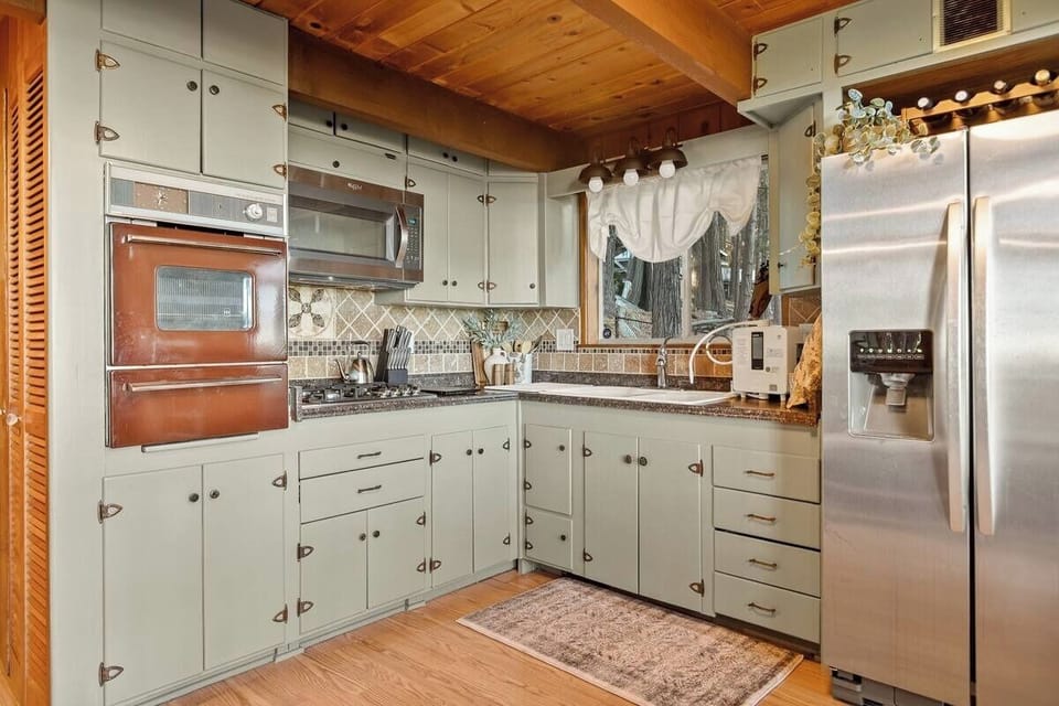 Fully equipped rustic kitchen with modern appliances