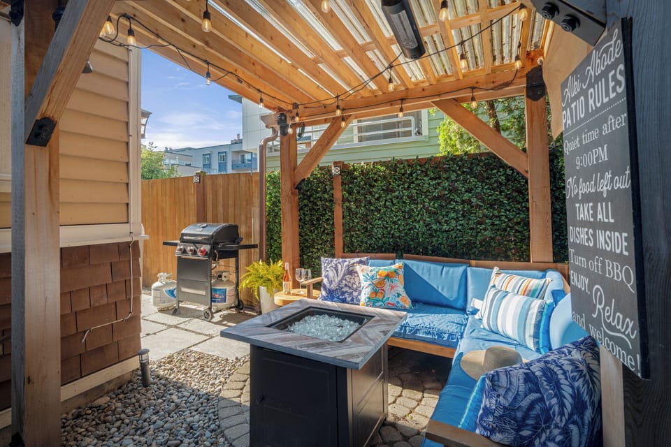 Unwind under twinkling lights by the fire pit