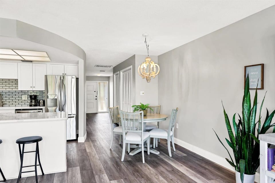 Your bright, open-concept space flows seamlessly from kitchen to dining, with modern touches and natural light creating the perfect setting for memorable meals.