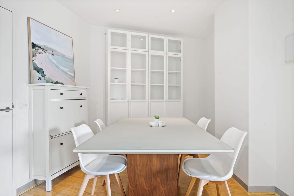 Dining area with table seating, perfect for meals or work