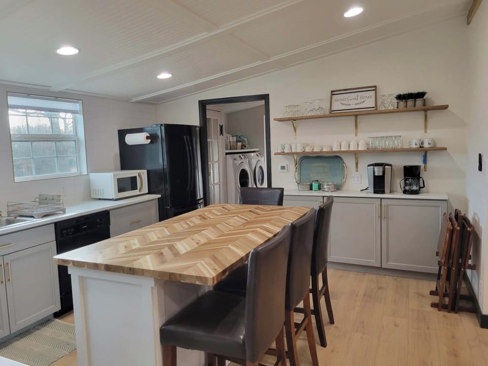 Spacious open kitchen with eat-in island and dedicated coffee bar