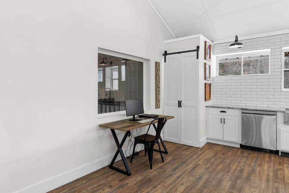 Laundry closet and a great spot to plug in(if you have to).
