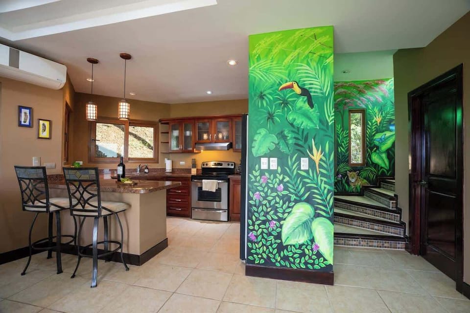 Kitchen Area and Newly Artwork Decoration on Staircase Heading to 2nd Floor