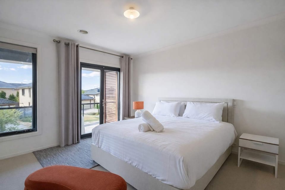 master king ensuite level 1 with balcony and view