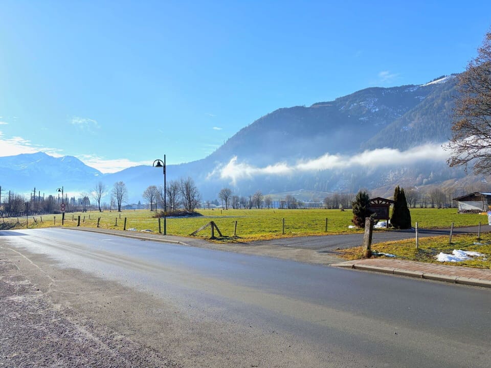 Sky, Mountainous Landforms, Mountain, Road Surface, Hill, Road, Mountain Range, Cloud, Landscape, Highland