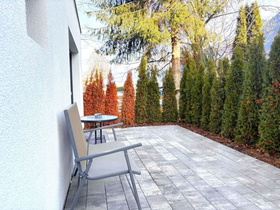 Woody Plant, Garden, Flagstone, Concrete, Landscaping, Outdoor Furniture, Walkway, Hardwood, Evergreen