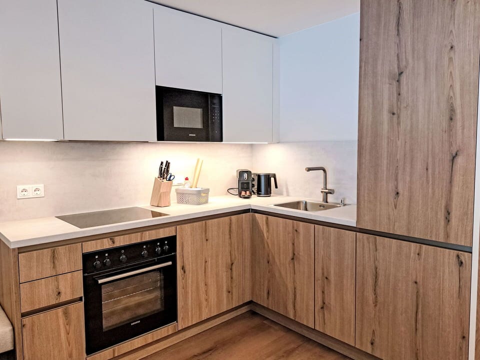 Interior Design, Wood, Flooring, Furniture, Countertop, Cabinetry, Kitchen, Floor, Wood Flooring, Kitchen Appliance