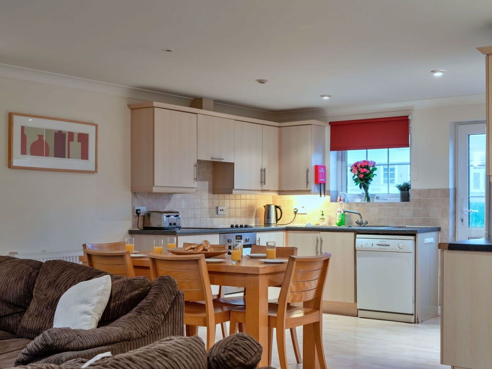 Furniture, Interior Design, Flooring, Kitchen, Countertop, Wood, Floor, Cabinetry, Kitchen Appliance, Ceiling