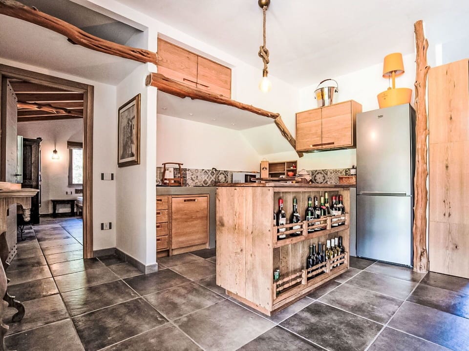 Furniture, Kitchen, Interior Design, Countertop, Flooring, Wood, Cabinetry, Ceiling, Floor, Room