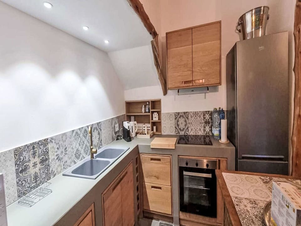 Wood, Flooring, Kitchen, Countertop, Interior Design, Floor, Cabinetry, Furniture, Home, Room