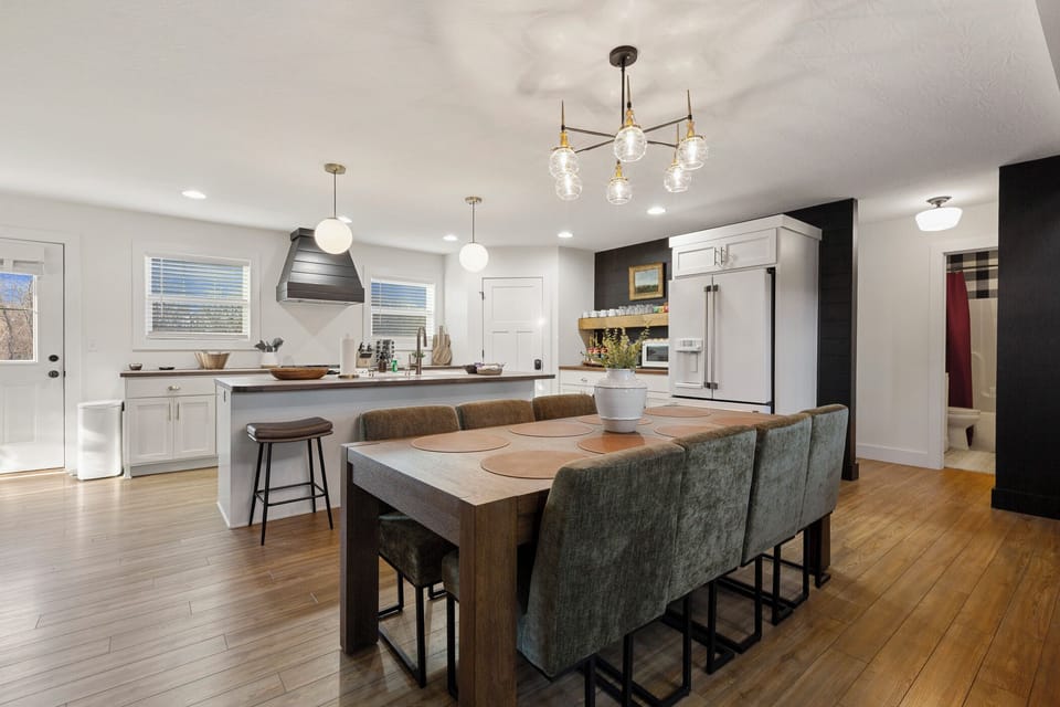 Open concept space with kitchen/dining/living area