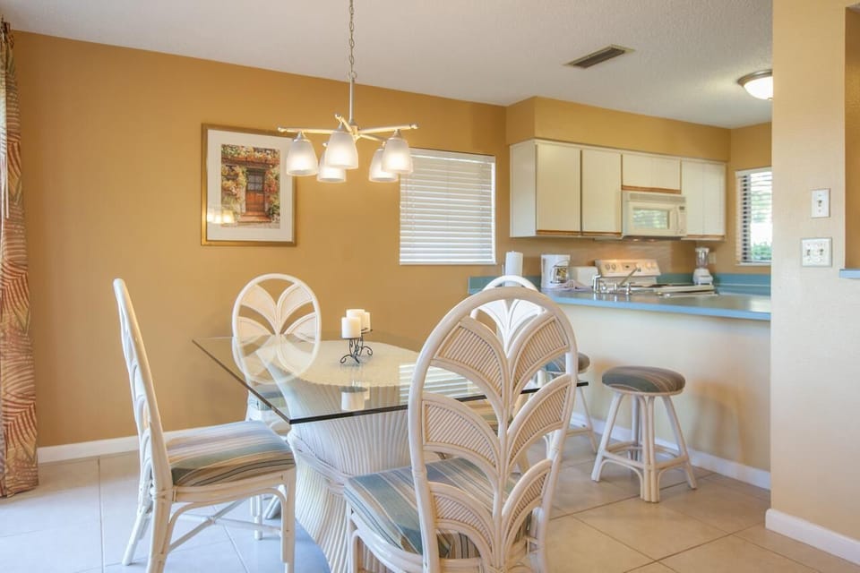 Gather for meals in the bright dining nook and open kitchen.