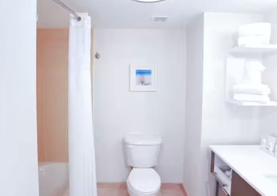 Refresh easily in a clean bathroom with bright lighting.