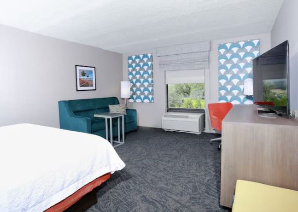 Stretch out in a calm room with lounge seating and views.