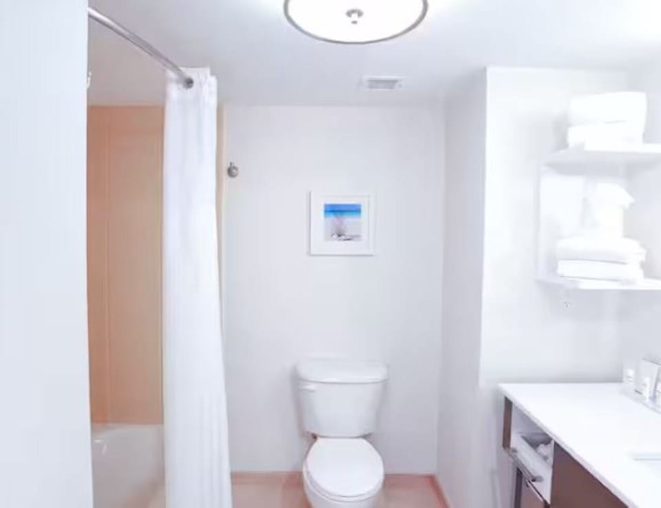 Refresh easily with a spotless shower and bright vanity lighting.