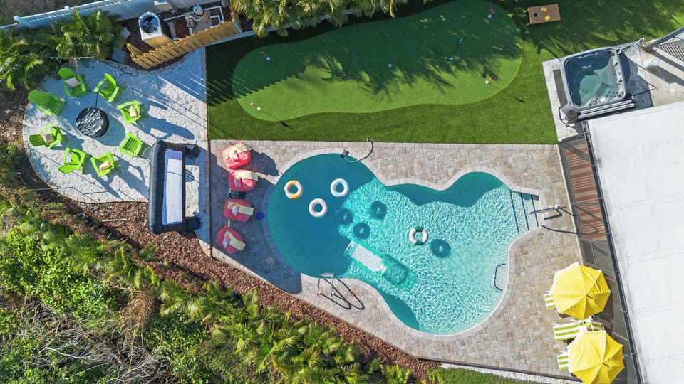 From above, it’s even better. One look at this backyard and you’ll see why outdoor fun, relaxation, and unforgettable memories live right here.