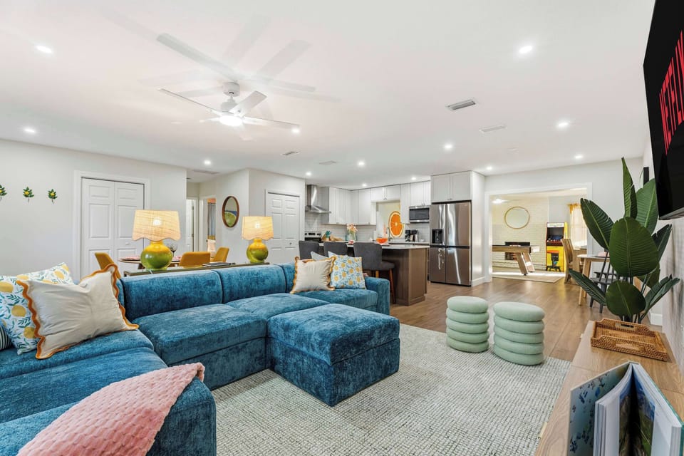 Kick back, relax, and let the good vibes flow. Comfy couches, cozy corners, and plenty of room for memories—this living room was made for you!