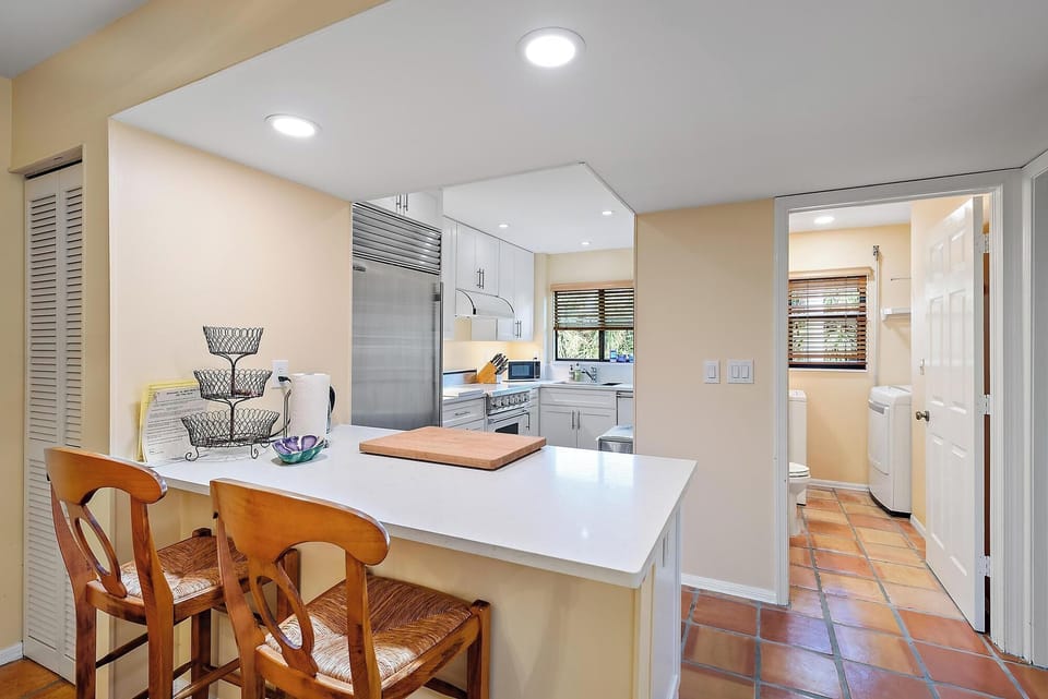 Island view into newly renovated chef's kitchen.