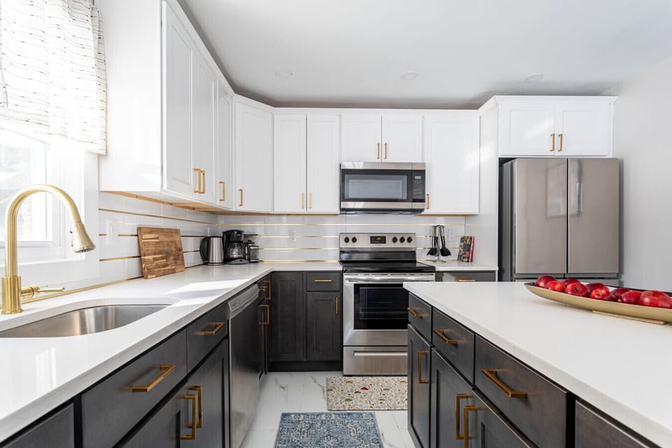A sleek kitchen with a spacious island, designed for easy meals