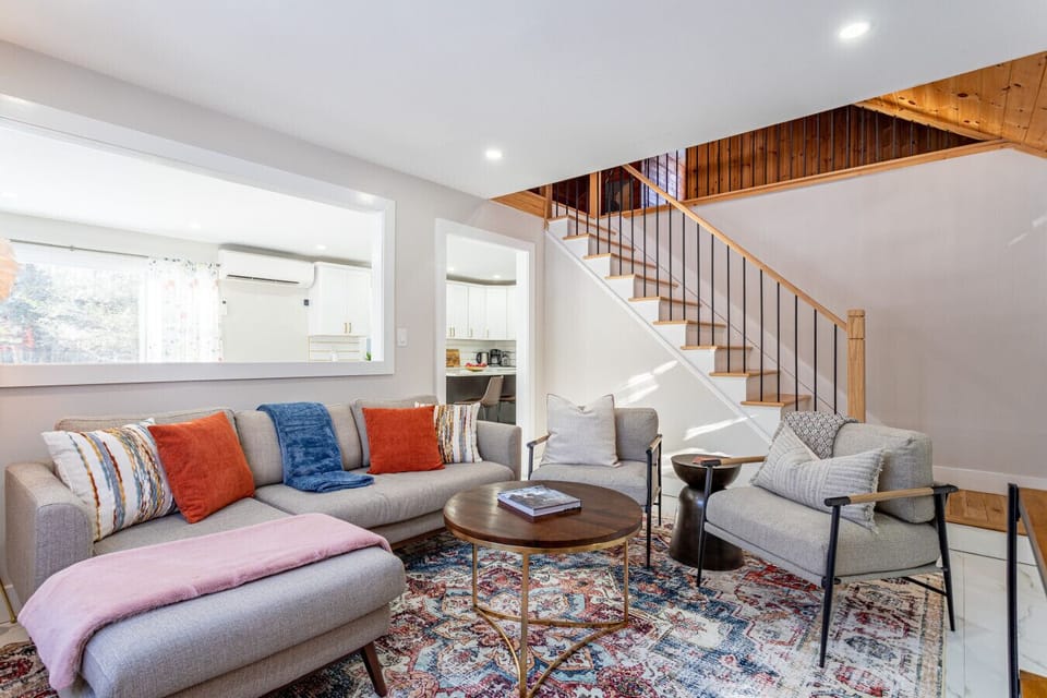 Curl up in this cozy, color-kissed living room