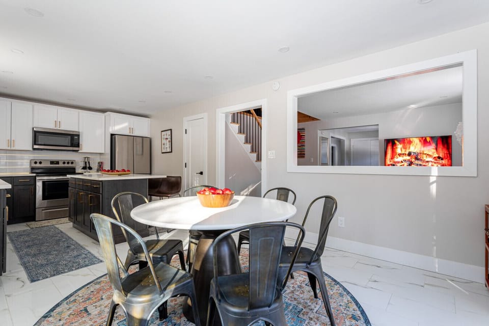 Dining room with views to the living room and TV