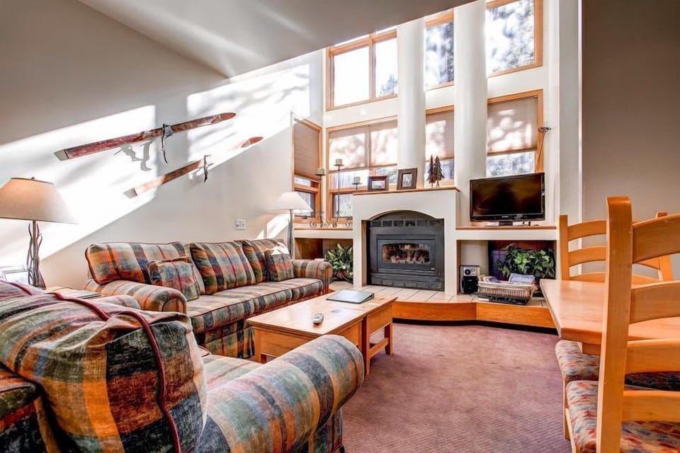 Relax in the cozy living area, complete with fireplace